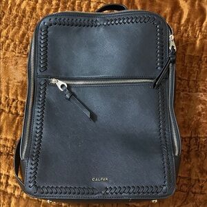 Calpak Black Backpack with Braided Detail and gold hardware